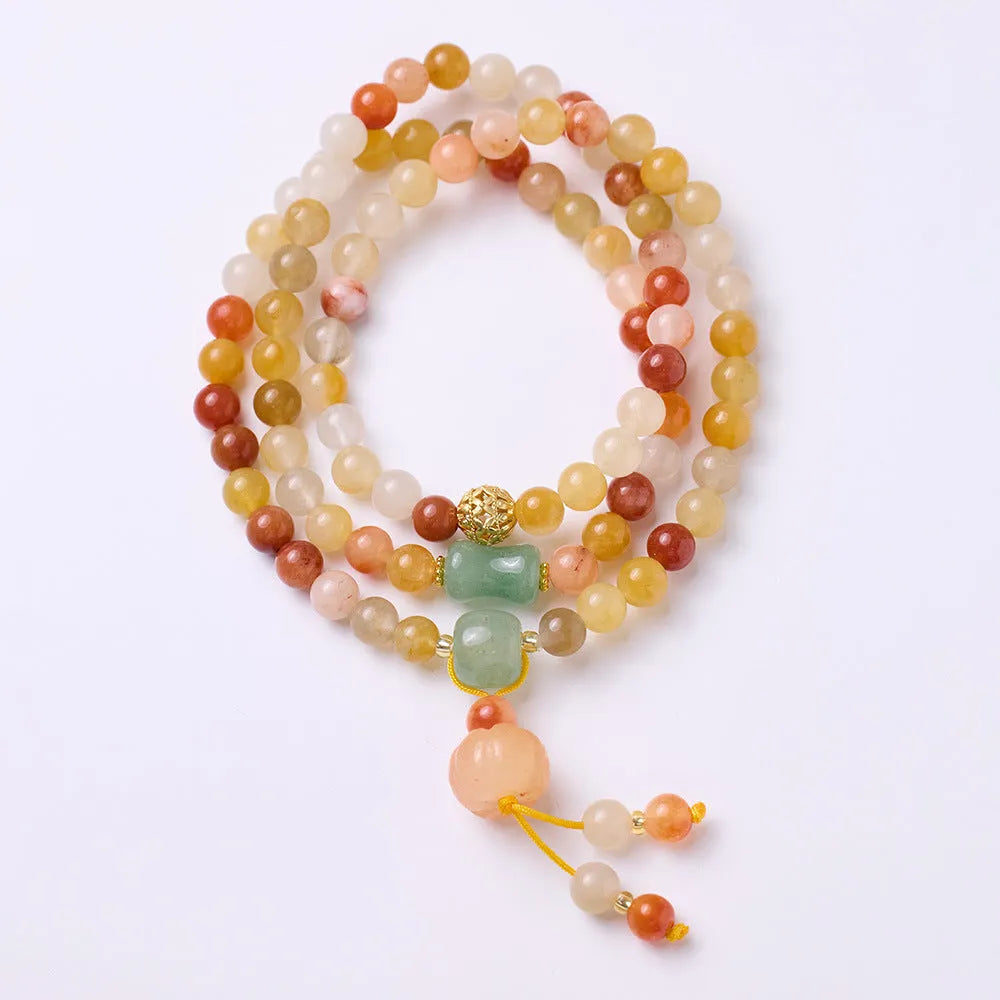 Women's handcrafted three-circle pumpkin tassel bracelet in Jinsi Jade