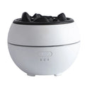 White round flame aroma diffuser humidifier with water tank and timer controls on a desk.