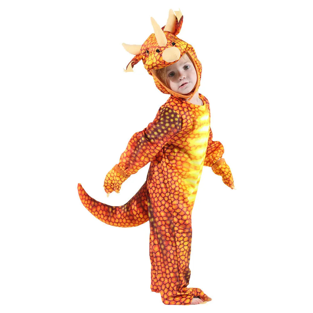 Child wearing a green Jurassic dinosaur Halloween costume with a tail and hood.
