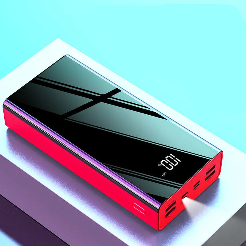 Large black or red 40000mAh power bank showing LCD display with plastic case.