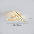 Modern ceramic ceiling light with six wave-style arms in black or gold finish.