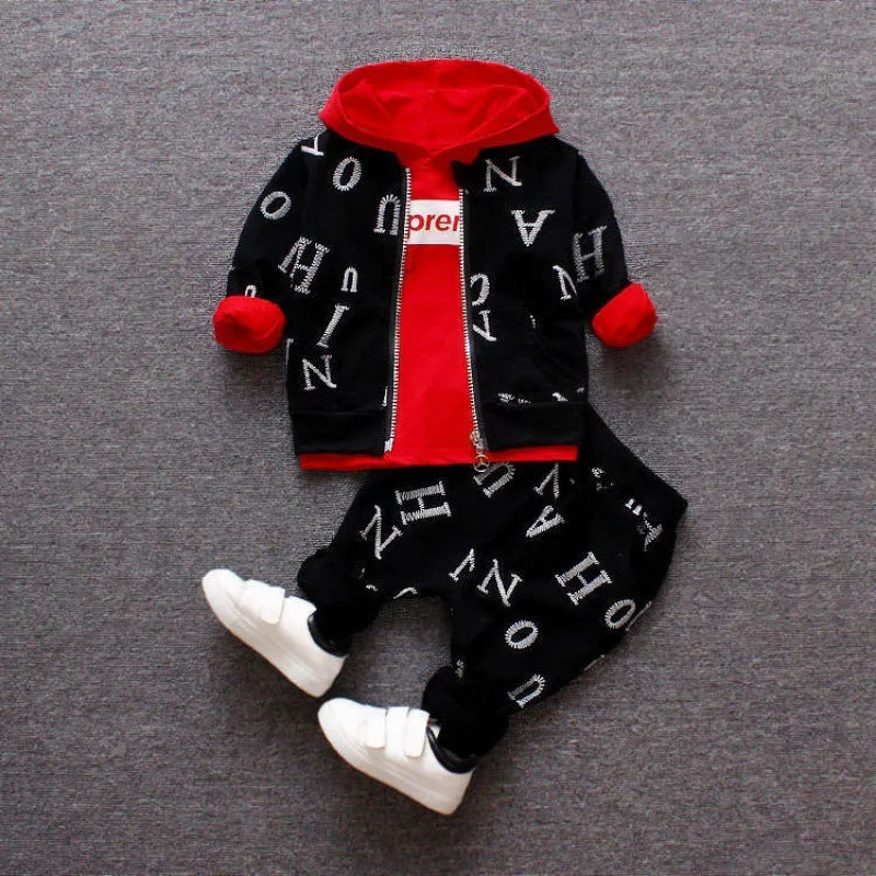 Red and white children's long sleeve two-piece clothing set made from polyester and vinylon fabric.
