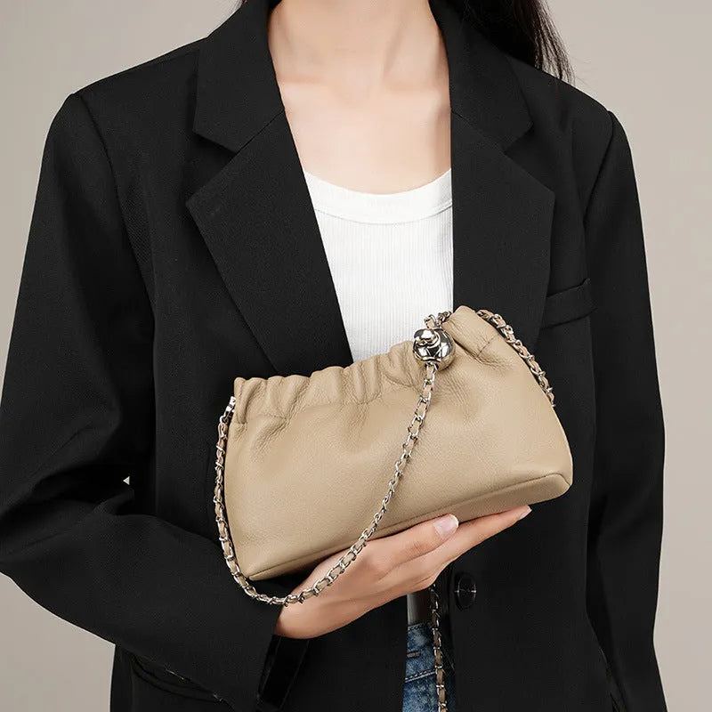 Women's genuine leather dumpling-shaped crossbody bag in black with single shoulder strap