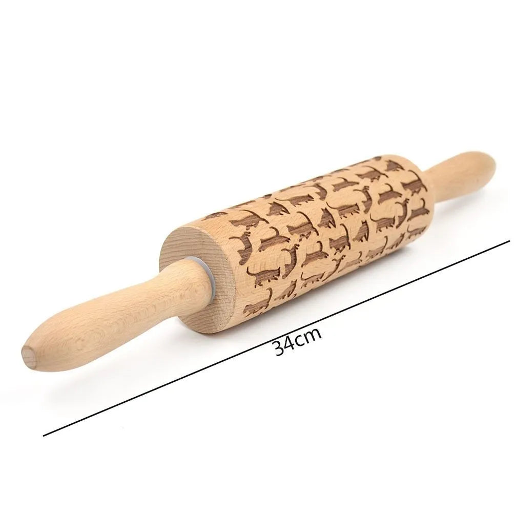 Wooden rolling pin with embossed Christmas patterns including reindeer and snowflakes on a 45cm length.
