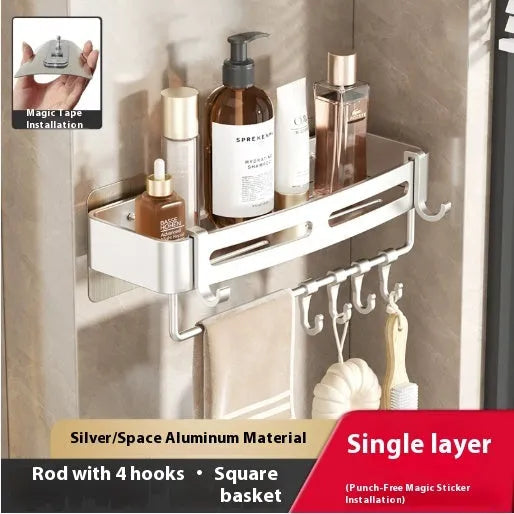 Gun grey punch-free bathroom corner storage rack with triangle basket mounted on wall.