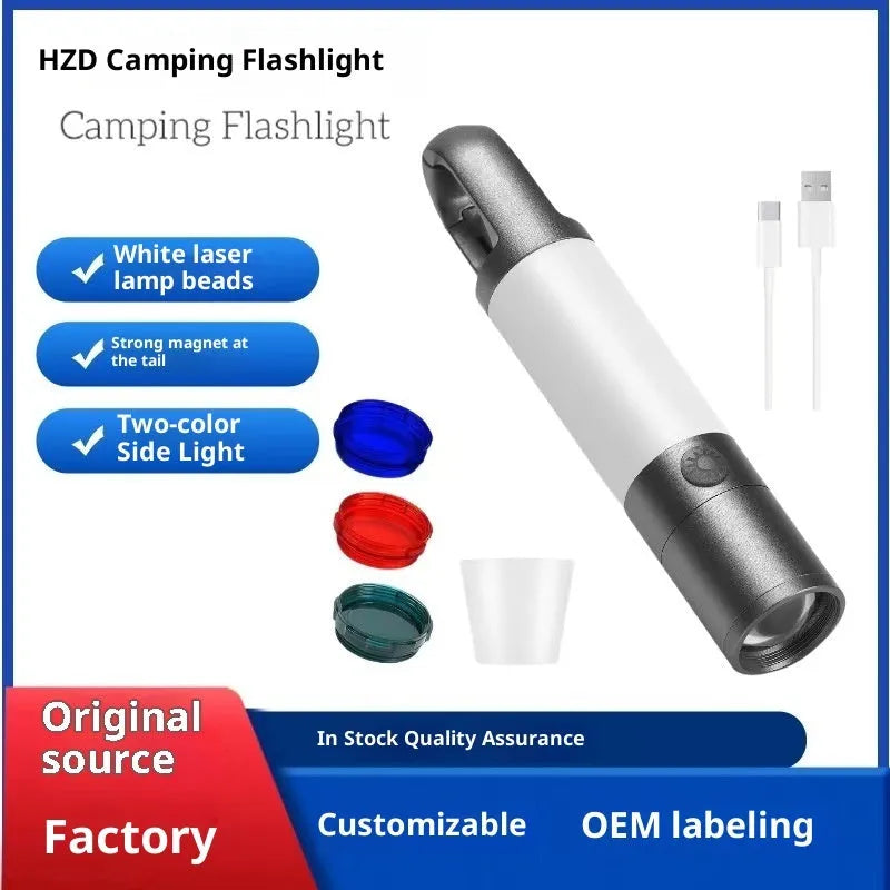Silver aluminium alloy outdoor charging LED work light with magnetic top and hook, on a dark surface