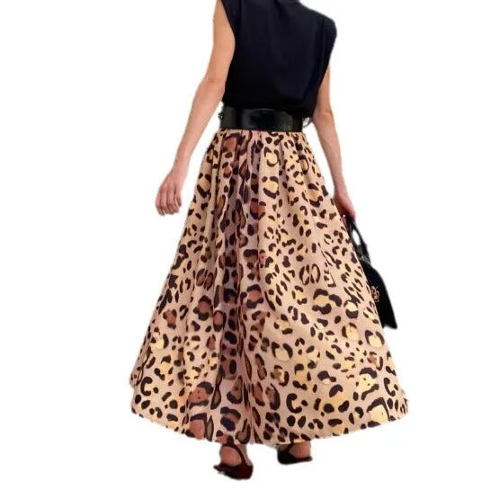 Brown leopard print women's A-line long skirt with a big hem on a model.