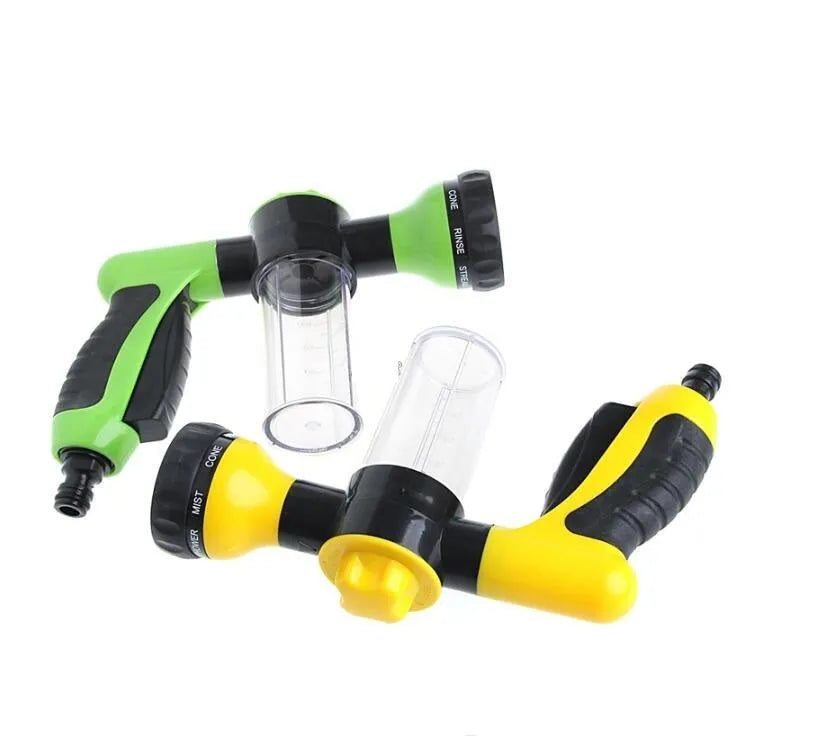 Green high-pressure foam spray gun with adjustable nozzle for car and household cleaning.