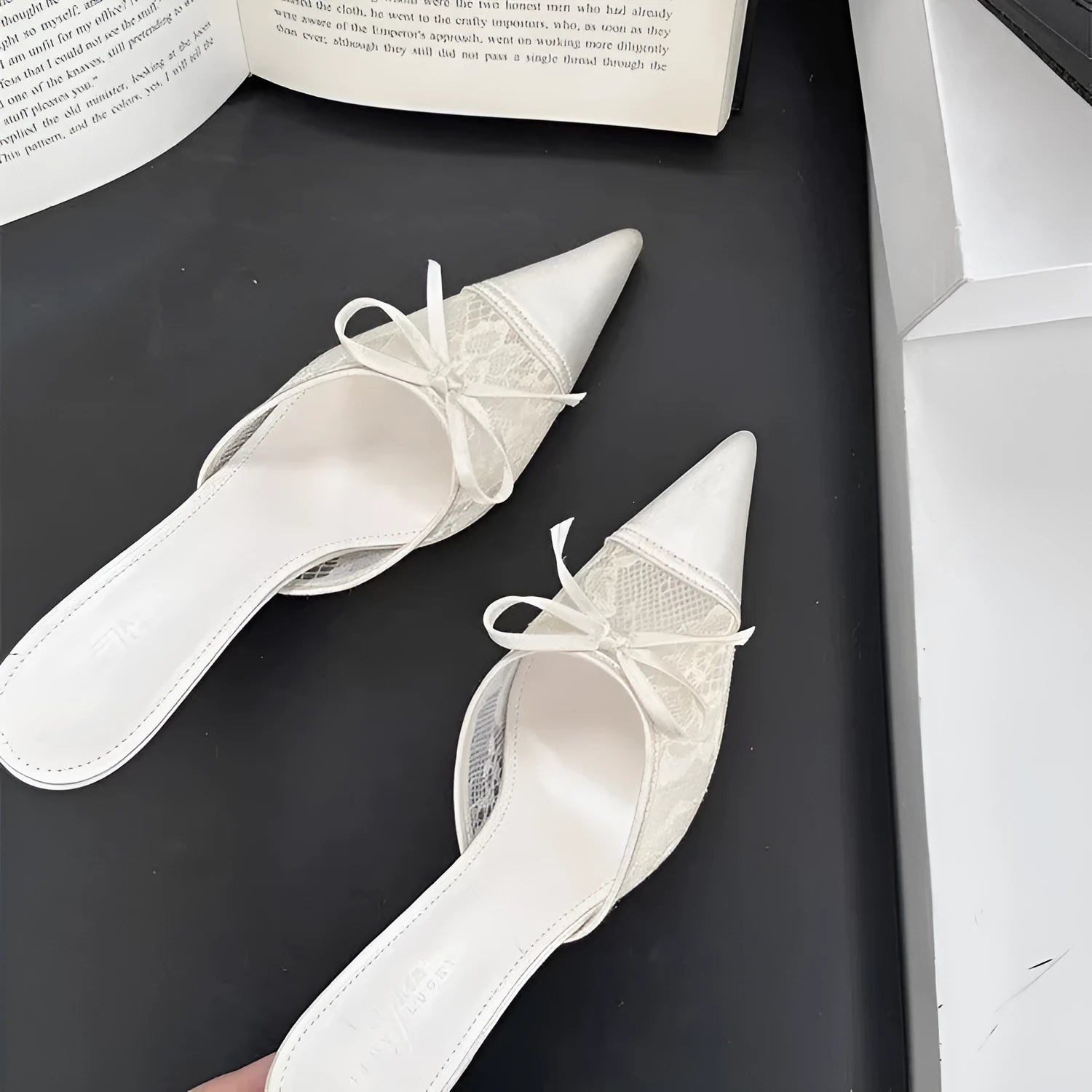 Women's light brown lace-up pointed toe high heels with a bowknot detail on the mesh upper.