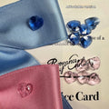 Adjustable blue dog hair band with a large pink princess bow on a white background