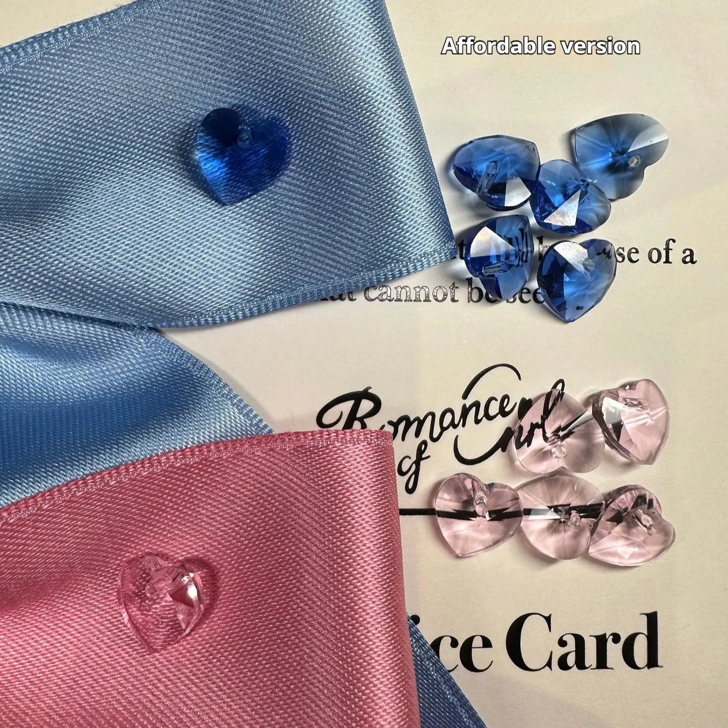 Adjustable blue dog hair band with a large pink princess bow on a white background