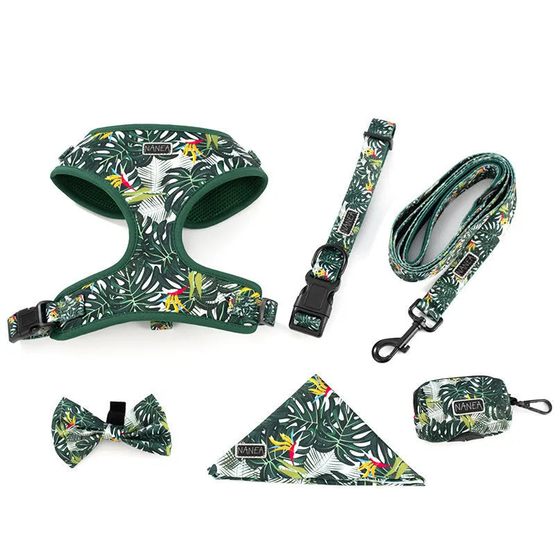 Six-piece adjustable cloth dog harness set with lead, collar, waste bag, bow, and scarf.