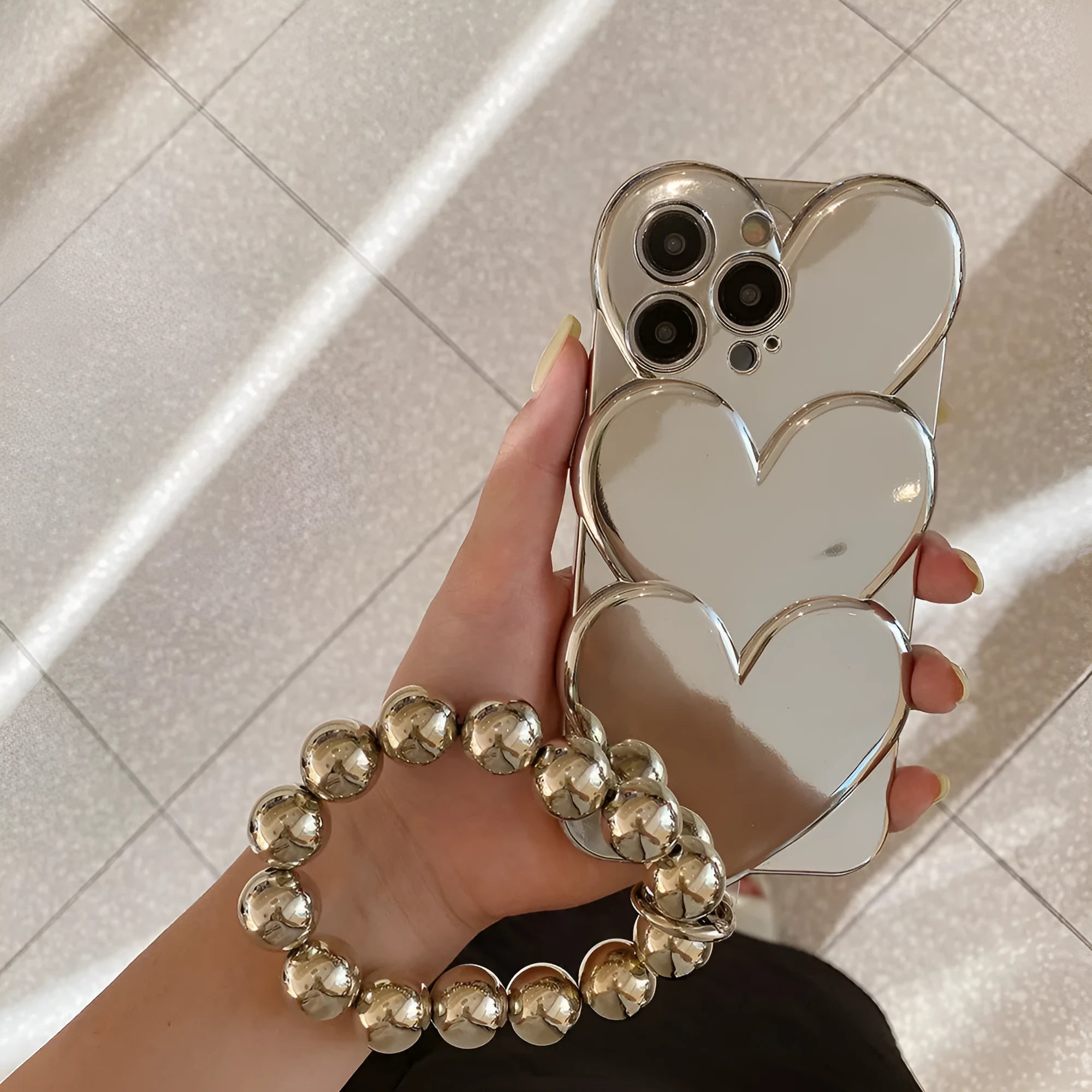 iPhone mobile phone case with shiny silver love electroplating design on a soft TPU back cover.