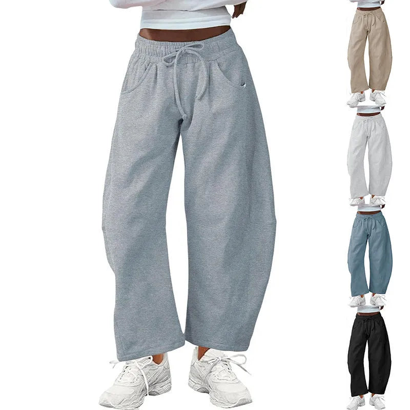 Women's loose-fit cropped sweatpants with drawstring waist and side pockets in cotton blend fabric