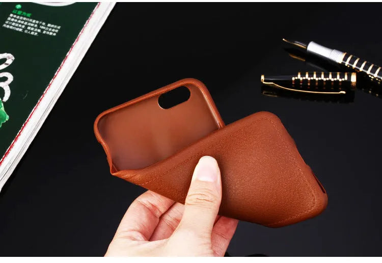 Leather TPU iPhone case shown in Black, Brown, Navy Blue, and Wine Red colours.