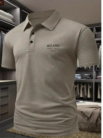 Men's loose fit lapel collar polo shirt in pinhole cloth fabric, shown in a available colour.