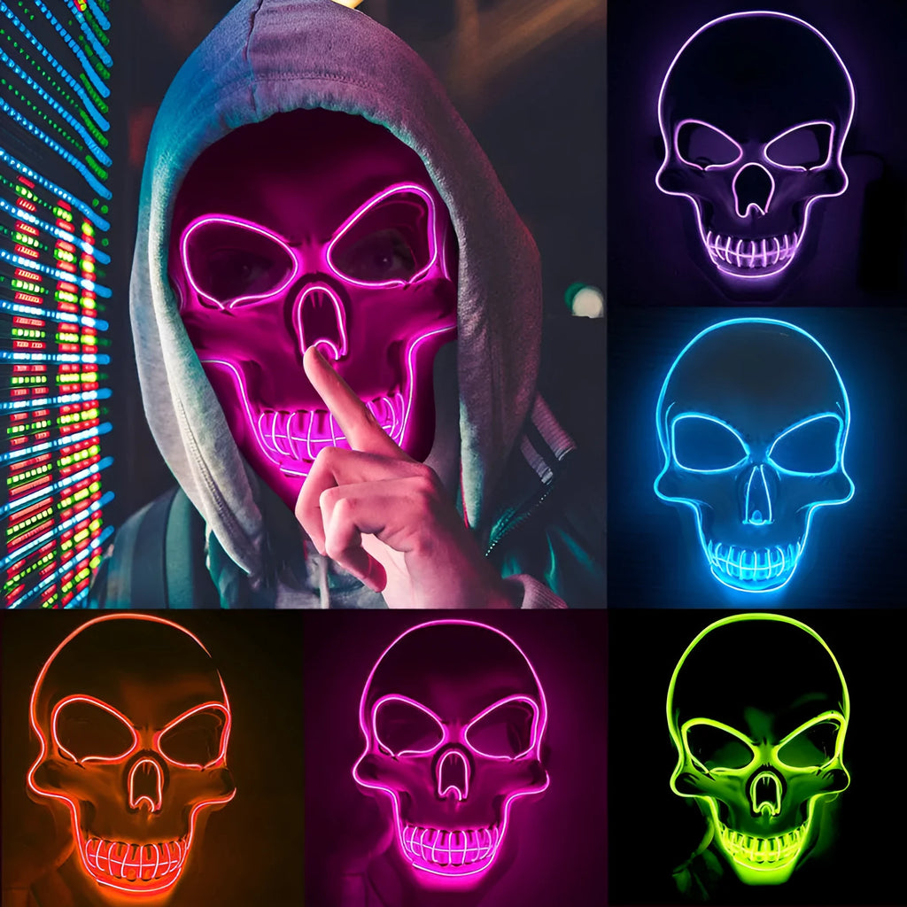 A person wearing a black LED skeleton mask with glowing red eyes and mouth at a party.