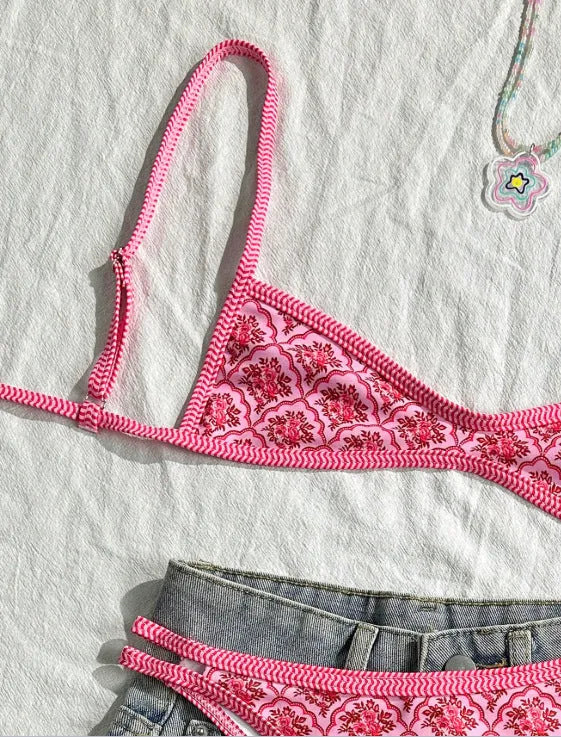 Pink printed two-piece bikini set with shoulder straps and exposed back cut-out for ladies