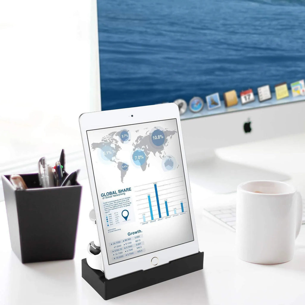 Black eight-in-one desktop charging station with five USB ports and a square wireless charging panel.