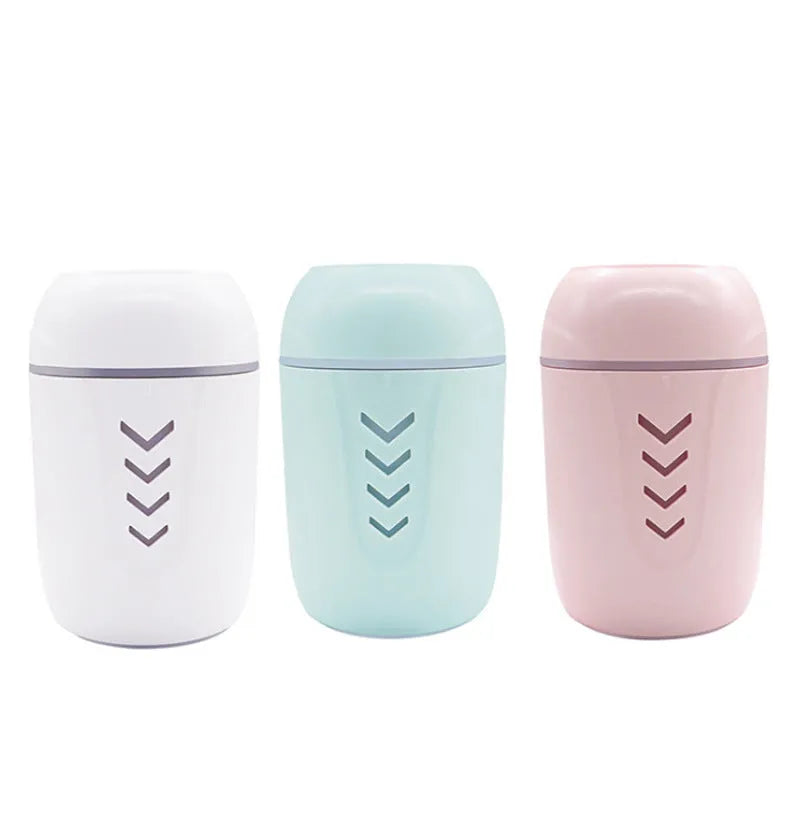 Blue columnar portable car humidifier with USB cable and aromatherapy function.