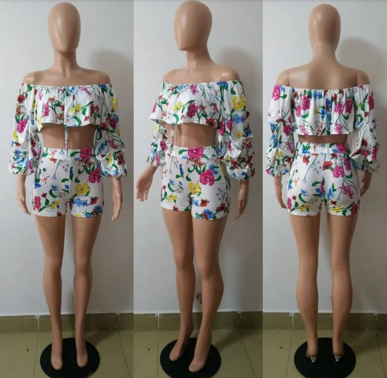 Women's multicolour digital print pyjama set with a short top featuring fluffy long sleeves and matching shorts.