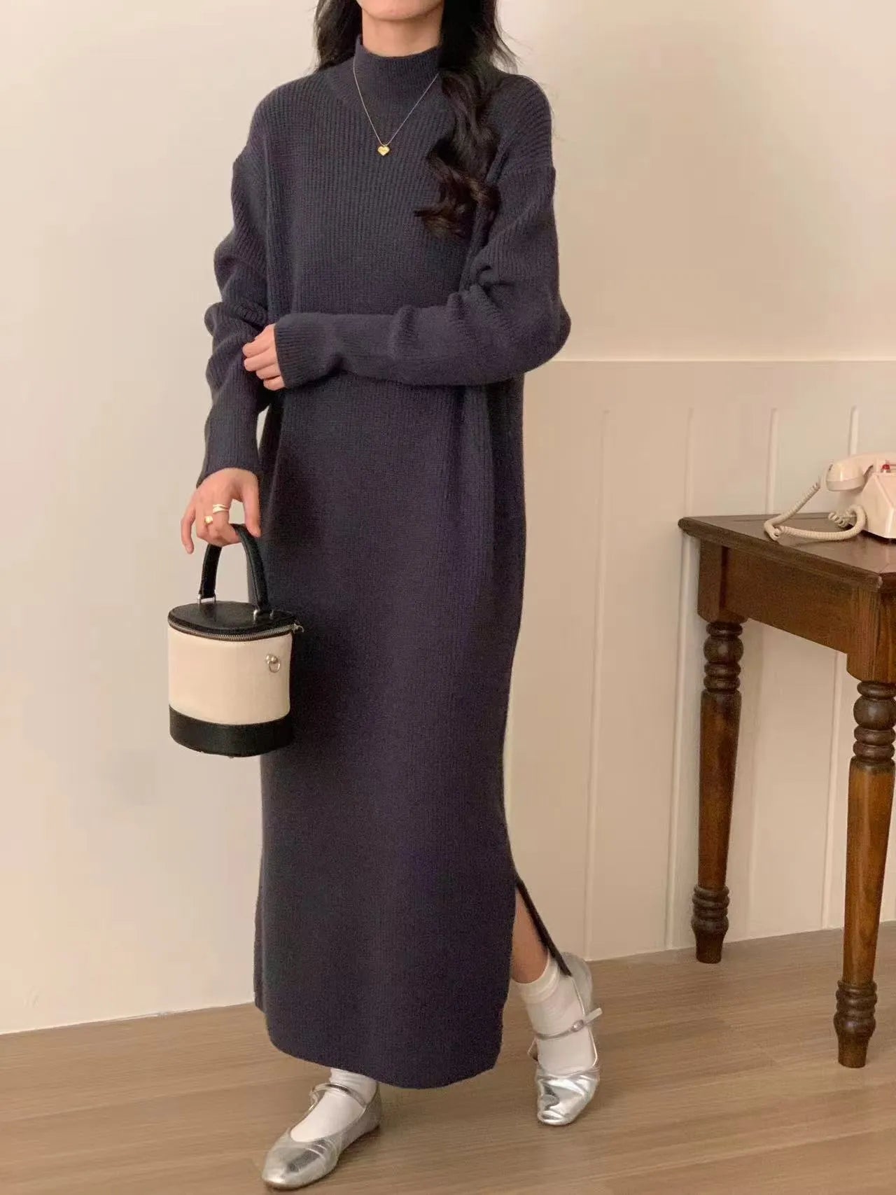 Acrylic half turtleneck knit dress in knee-length design with long sleeves