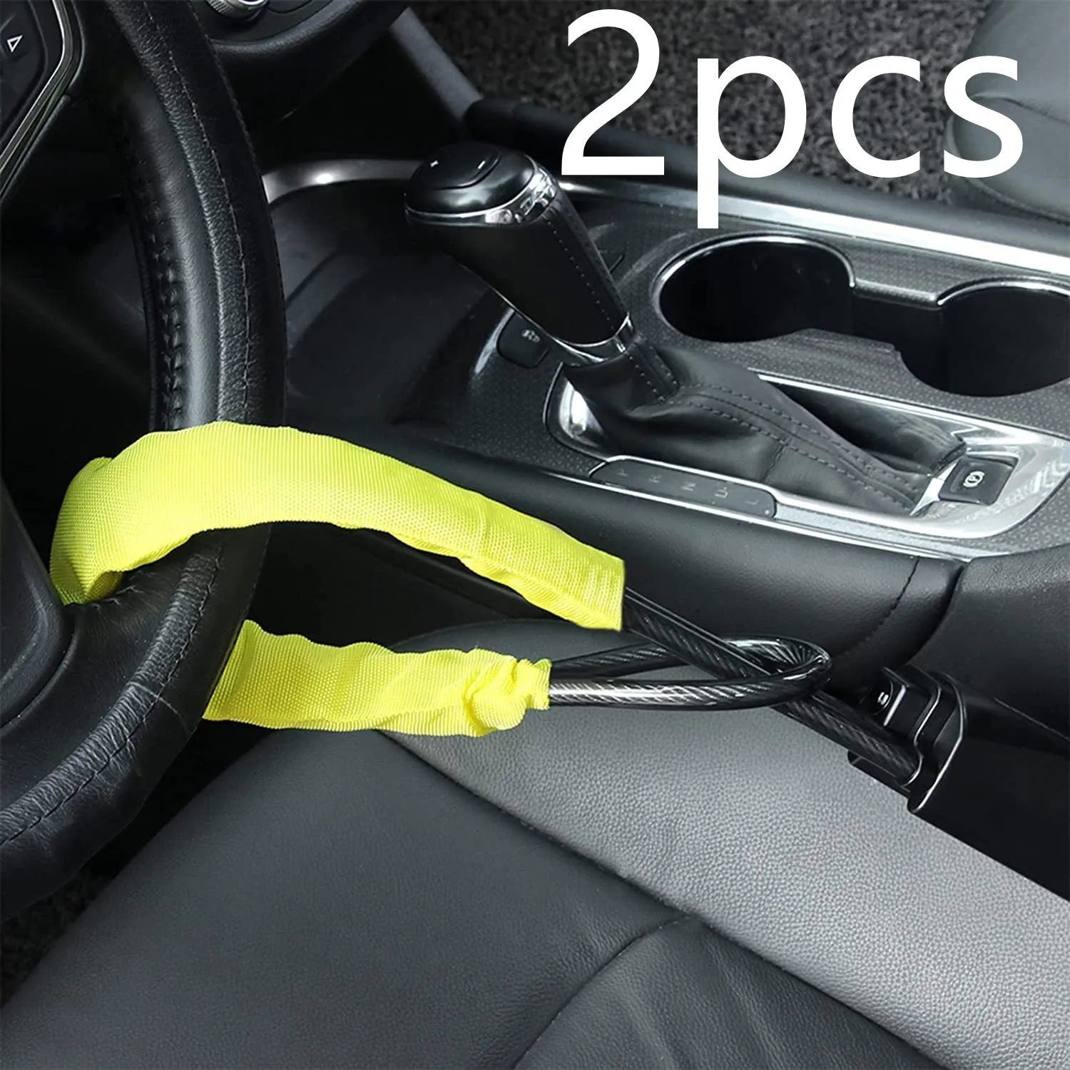 Red iron car steering wheel lock with wire rope, shown on a GM vehicle steering wheel.