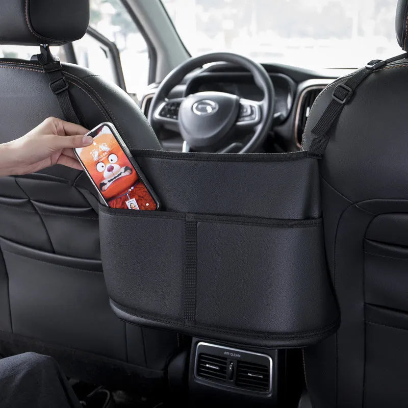 Black leather car seat storage bag with sports carbon fibre pattern for centre console organisation