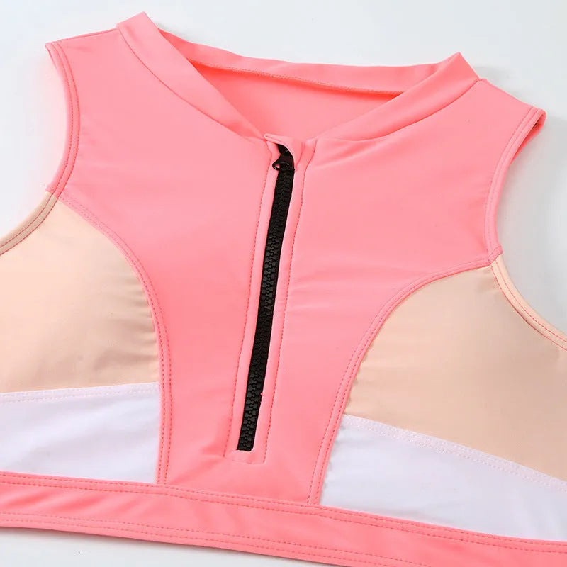 Pink high waist split leg bikini swimsuit with mesh lining on mannequin