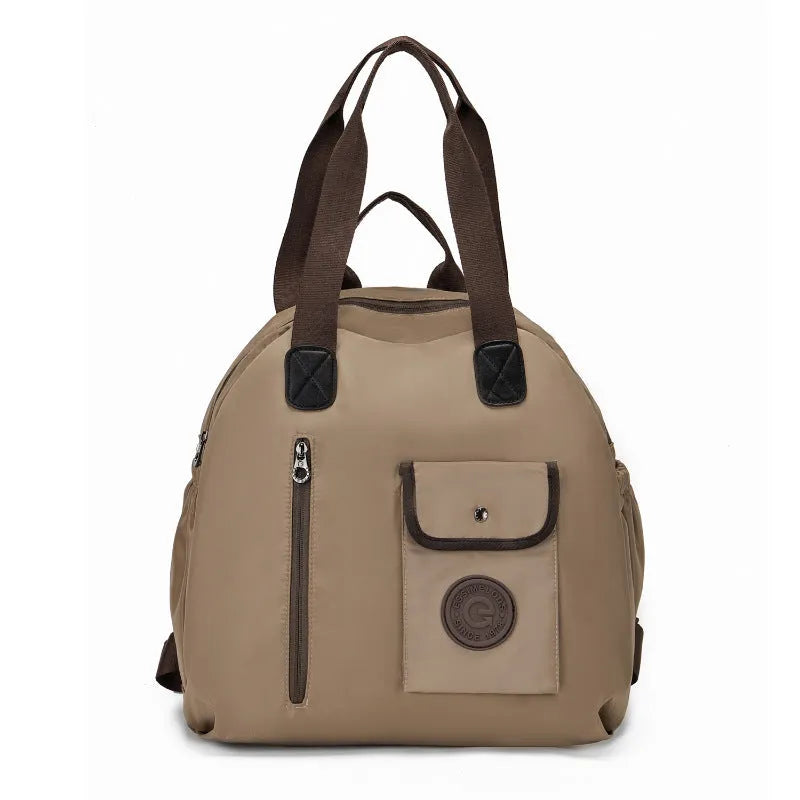 Large outdoor nylon backpack in black, shown with dimensions and sandwich pocket detail.