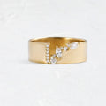 Gold-colour women's ring with shining zircon stone on copper band