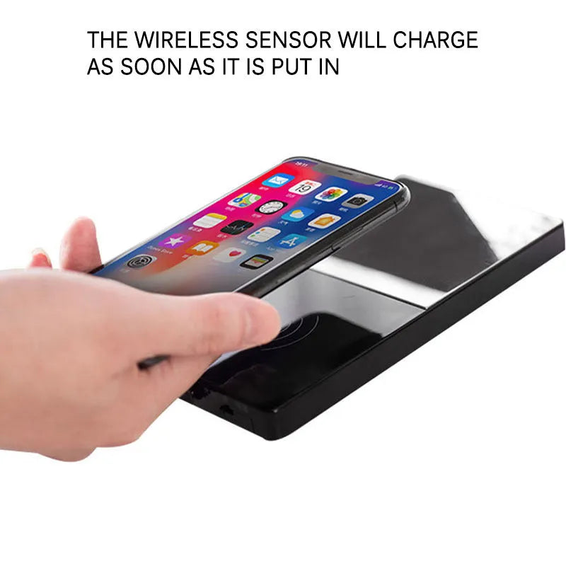 2-in-1 heated mug cup warmer and wireless charger on a desk with a coffee mug and smartphone