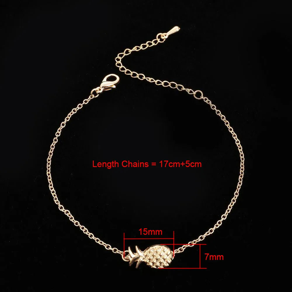 Women's alloy bracelet with pineapple fruit charm in gold or silver finish showing adjustable closure