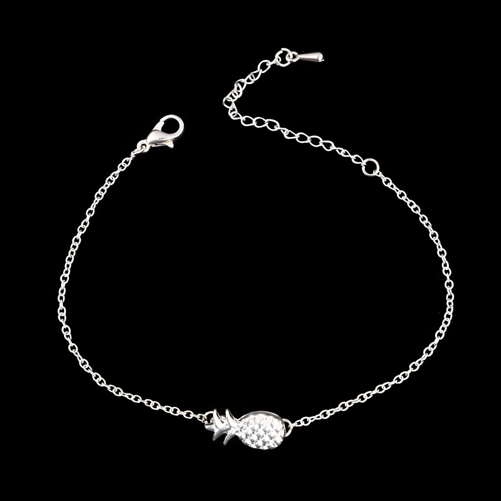 Women's alloy bracelet with pineapple fruit charm in gold or silver finish showing adjustable closure
