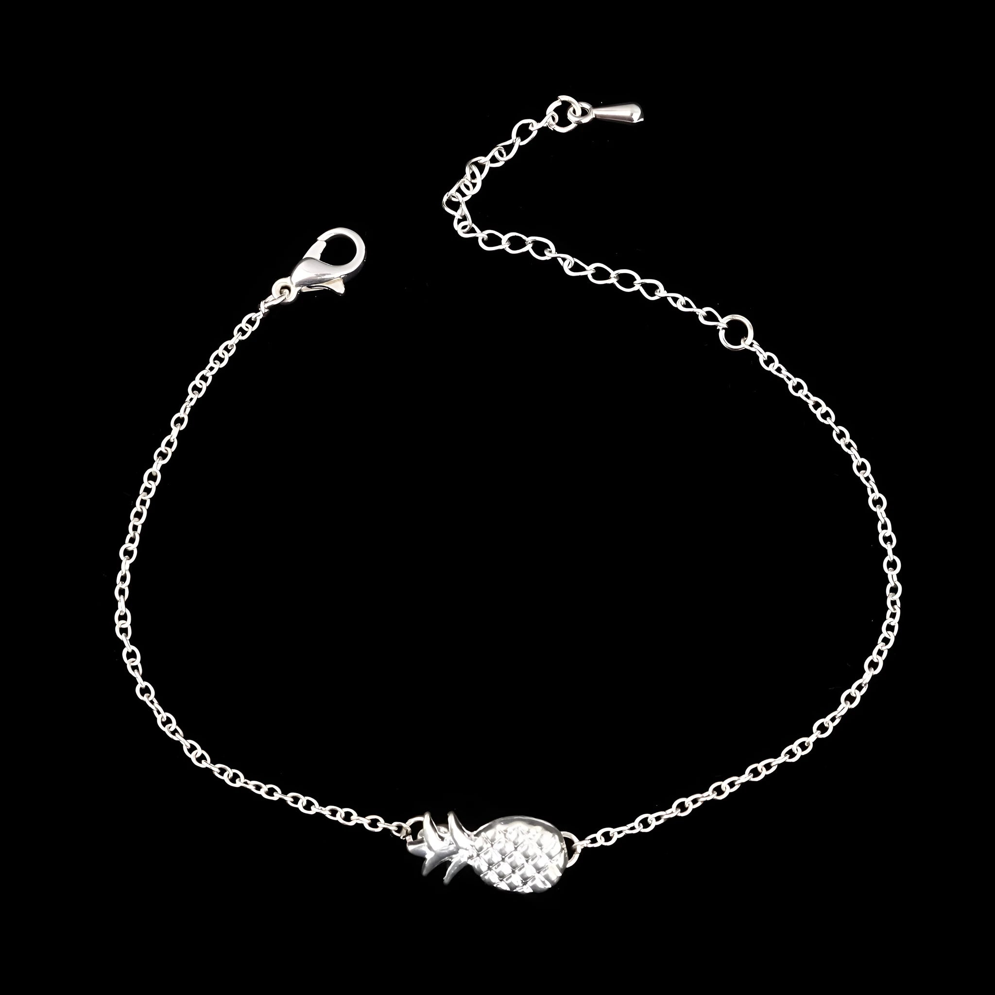 Women's alloy bracelet with pineapple fruit charm in gold or silver finish showing adjustable closure