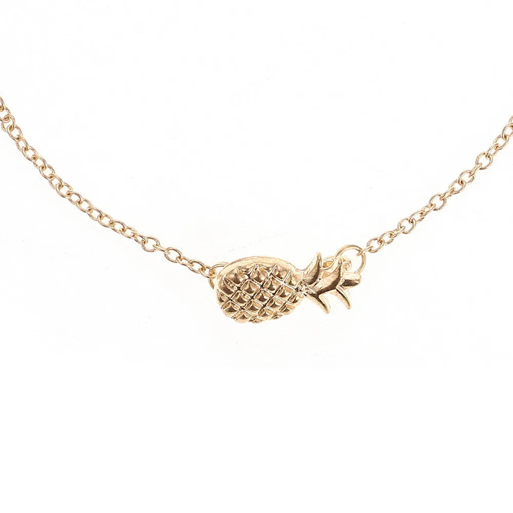 Women's alloy bracelet with pineapple fruit charm in gold or silver finish showing adjustable closure