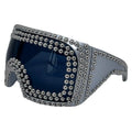 Men's square punk sunglasses with large rim and silver rivets on a dark background.