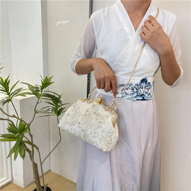 Pearl embroidered polyester handbag in horizontal square shape with double shoulder straps