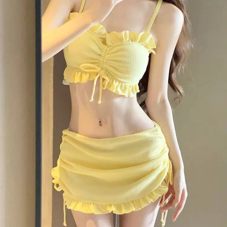 Women's milk silk bikini swimsuit in split style available in pitaya red, yellow, or black
