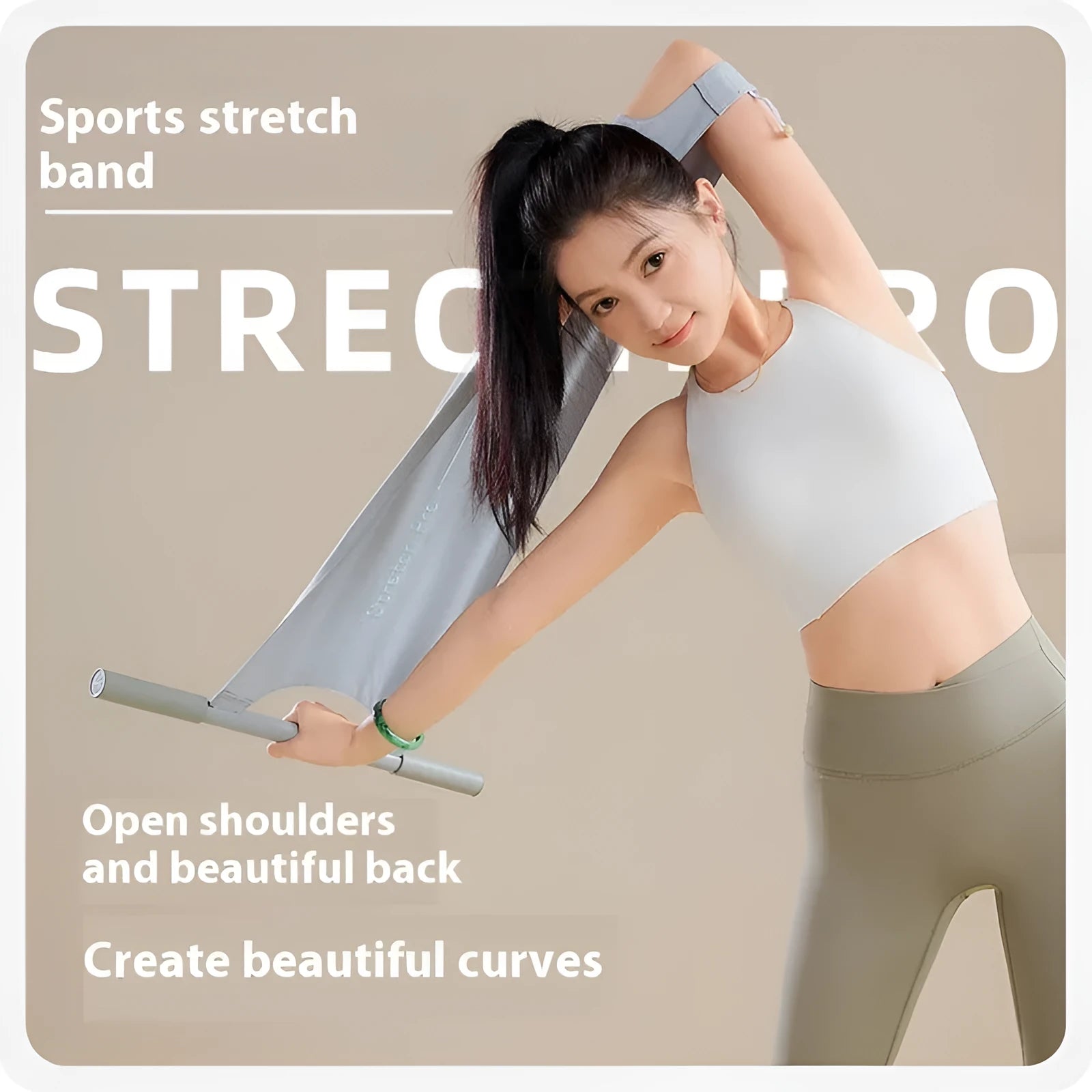 Grey and pink yoga stretching tool for open shoulder, back and hip flexibility.