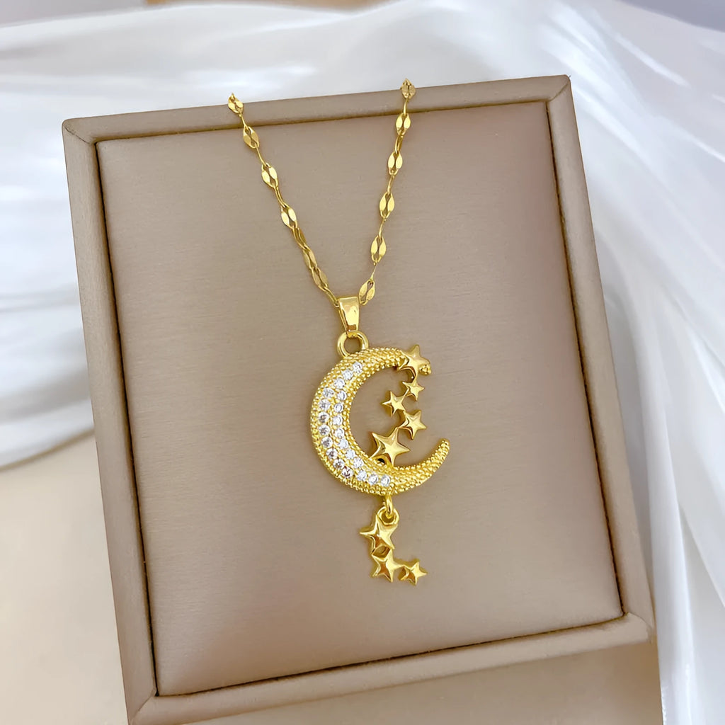 Geometric moon pendant necklace on a stainless steel chain with a copper accent.