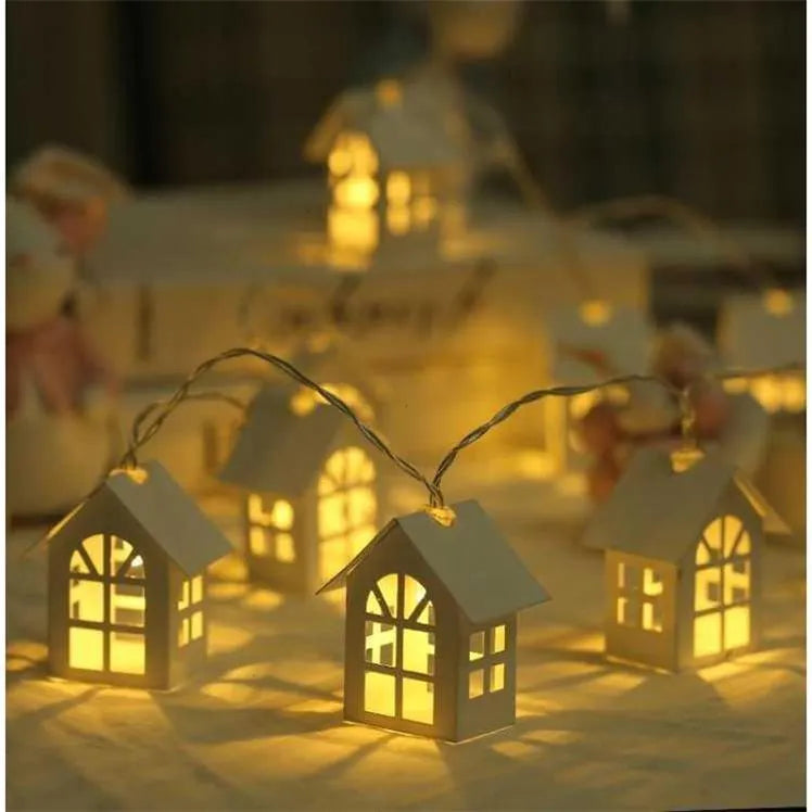 10 LED house-shaped warm white fairy light string on a 2-metre wire with battery and USB power options for Christmas or party decoration