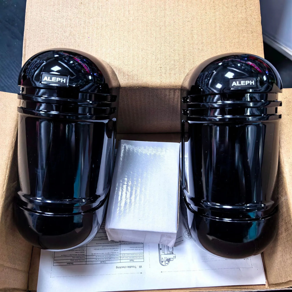 Black infrared anti-theft alarm detector pair for warehouse and commercial security