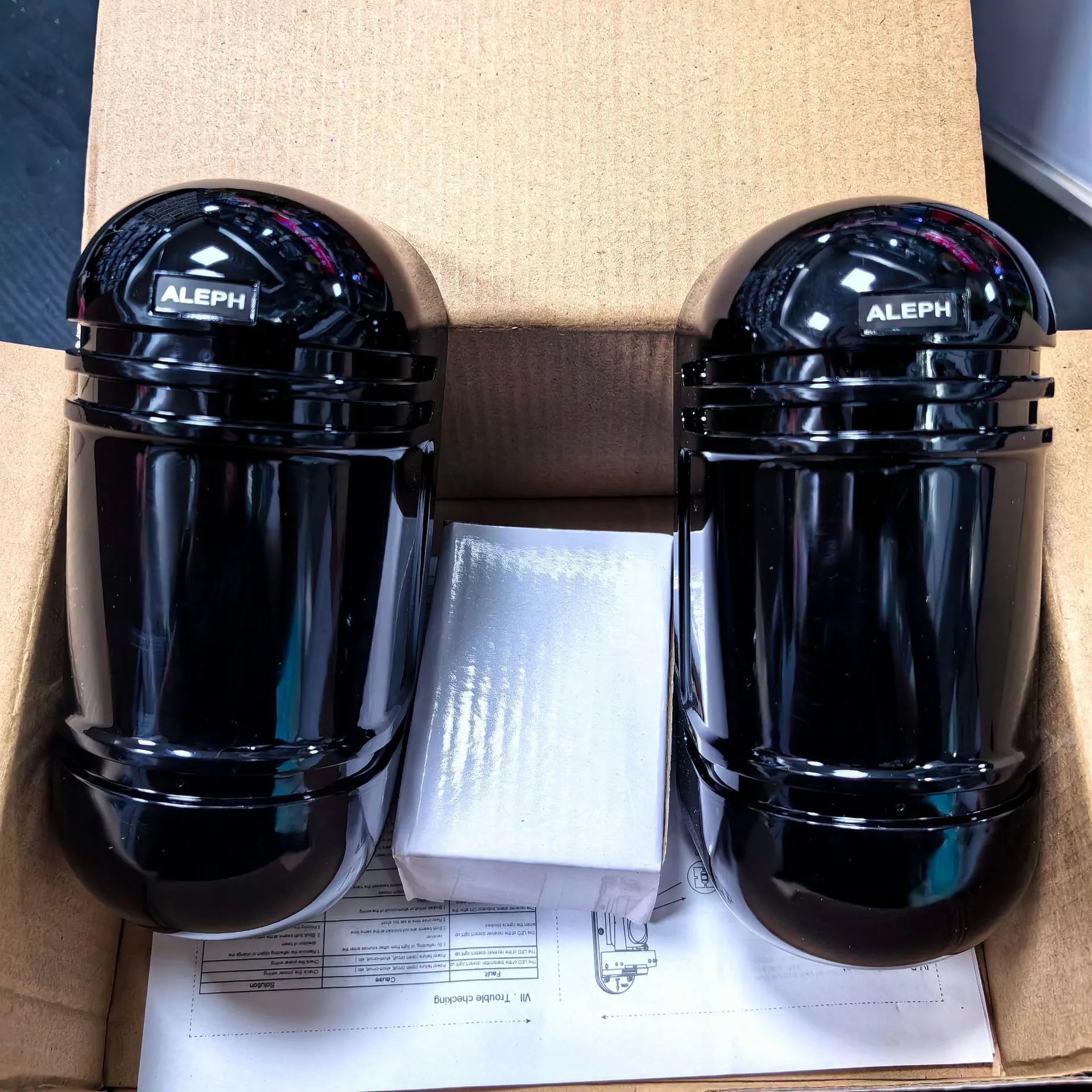 Black infrared anti-theft alarm detector pair for warehouse and commercial security
