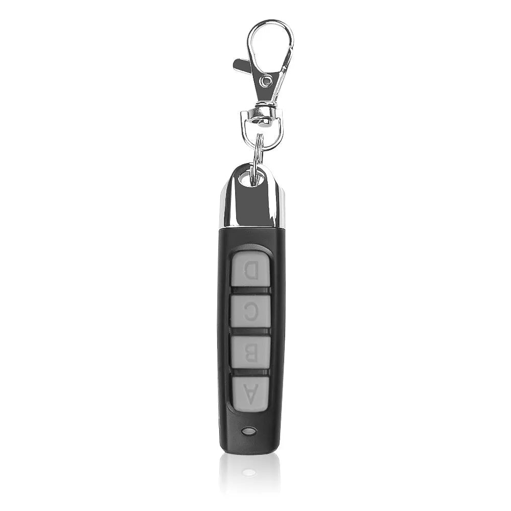 Rolling door remote control transmitter in black plastic casing with 433MHZ frequency and copy function