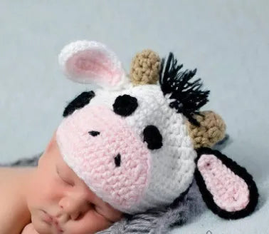 Hand-knitted white newborn cow suit with matching hat and pants for 0-3 month infants