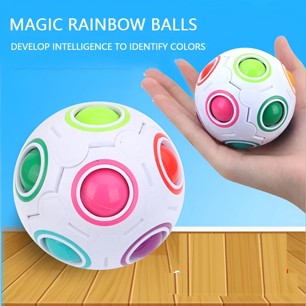 A 5.5 cm diameter rainbow-coloured plastic puzzle ball with a hexagon pattern.