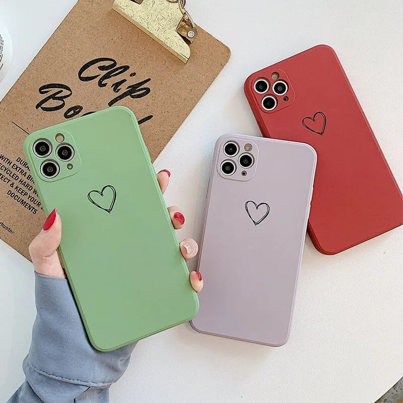 Solid colour TPU silicone back cover case for Apple iPhone on a table
