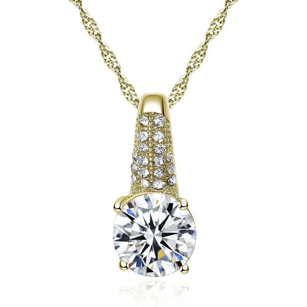 Gold and silver bridal necklace and earring set with copper base platinum finish on display