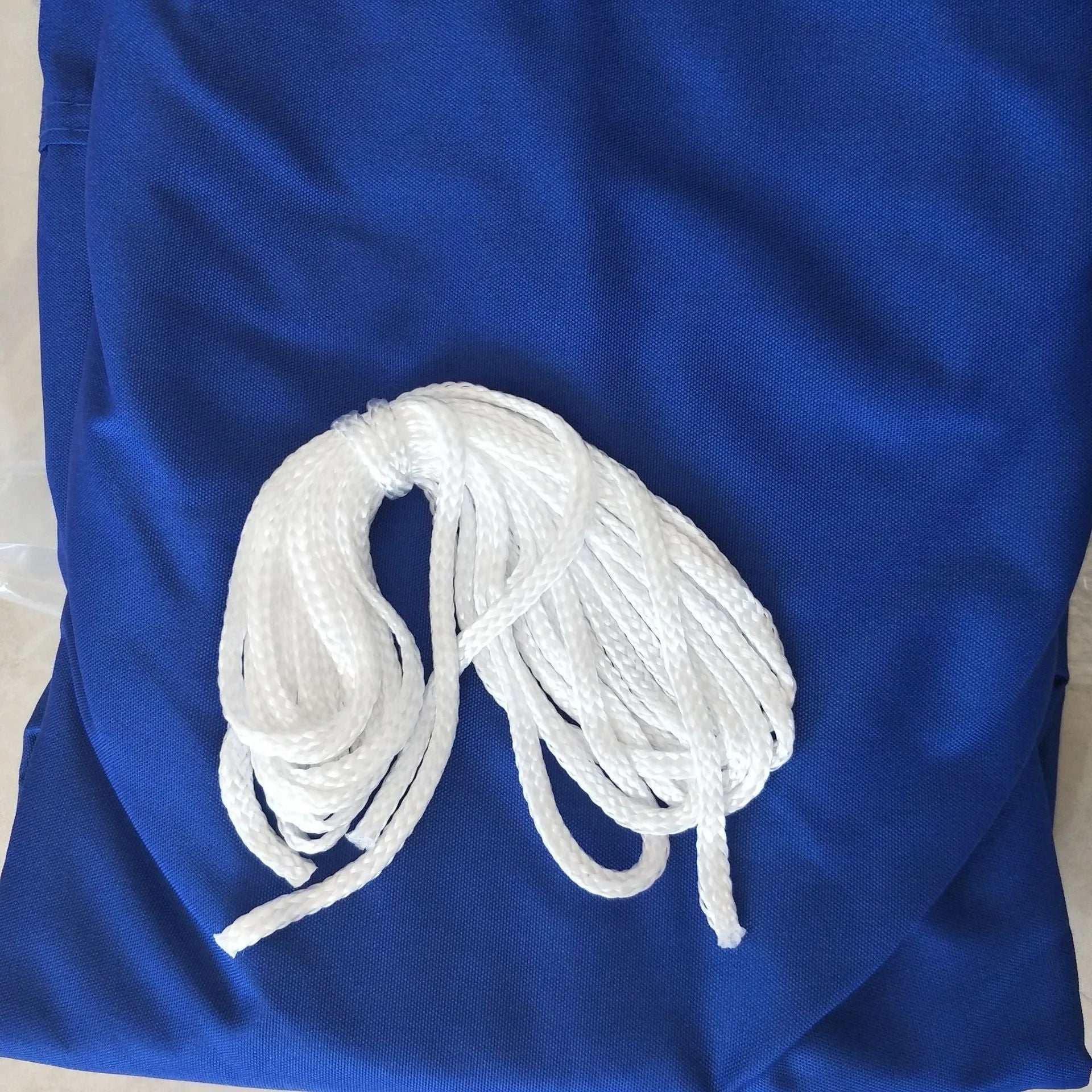 Rectangular blue shade sail measuring 3 by 4 metres providing outdoor UV protection